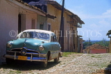 CUBA, Trinidad, old town street, old American car, CUB188JPL