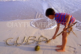 CUBA, Varadero, beach, boy writing Cuba on sand, CUB229JPL