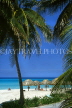 CUBA, Varadero, beach, coconut trees and thatched sunshades, CUB193JPL