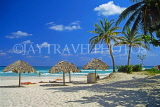 CUBA, Varadero, beach, thatched sunshades and coconut trees, CUB314JPL