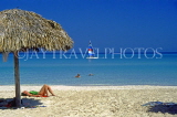 CUBA, Varadero, beach and seascape, sunbather and sunshade, CUB219JPL