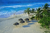 CUBA, Varadero, beach and thatched sunshades, CUB104JPL