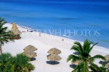 CUBA, Varadero, beach and thatched sunshades, CUB107JPL