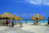 CUBA, Varadero, beach and thatched sunshades, CUB246JPL