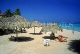 CUBA, Varadero, beach and thatched sunshades, CUB334JPL