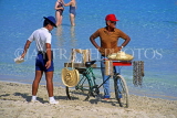 CUBA, Varadero, beach patrolman and crafts vendor, CUB255JPL