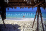CUBA, Varadero, beach view through thatched sunshade, CUB159JPL