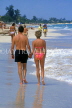 CUBA, Varadero, tourists walking along beach, CUB206JPL