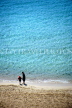 CYPRUS, Aiya Napa beach, two children walking along, CYP524JPL
