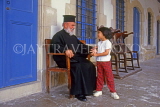 CYPRUS, Larnaca, Ayios Lazarus Church, priest talking to child, CYP290JPL