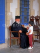 CYPRUS, Larnaca, Ayios Lazarus Church, priest talking to child, CYP534JPL