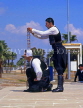 CYPRUS, Larnaca, cultural show, balancing glasses on head, CYP131JPL