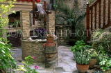 CYPRUS, Lefkara village, small courtyard with stone built well, CYP320JPL