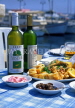 CYPRUS, Paphos, Kato Paphos, cafe table, with Fish Meze and Cyprus wine, CYP405JPL