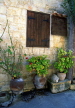 CYPRUS, Paphos area villages, KATHIKAS, courtyard window and flower pots, CYP437JPL