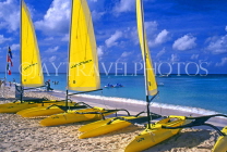 Cayman Islands, GRAND CAYMAN, Seven Mile Beach, and yellow sail catamarans, CAY206JPL
