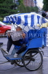 China, BEIJING, tricycle taxi driver, reading newspaper, CH132JPL