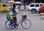 China, BEIJING, woman and bicycle with child on back seat, CH1377JPL