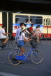 China, BEIJING, woman in shorts and bicycle, CH133JPL