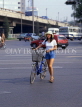 China, BEIJING, woman in shorts with bicycle, CH1371JPL