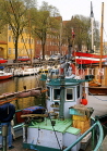 DENMARK, Copenhagen, Christianshavn, canalside boats, DEN157JPL