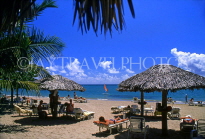 DOMINICAN REPUBLIC, North Coast, Playa Dorada, beach with sunbathers and sunshades, DR126JPL