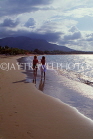 DOMINICAN REPUBLIC, North Coast, Playa Dorada, tourists walking along beach, DR451JPL