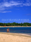 DOMINICAN REPUBLIC, North Coast, Puerto Plata, Playa Dorada, couple walking on beach, DR263JPL