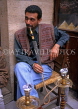 EGYPT, Cairo, man smoking Shisha Pipe (water pipe), EGY129JPL