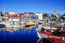 FAROE ISLANDS, Streymoy, Torshavn, waterfront buildings, and harbour boats, FAR45JPL