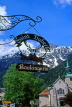 FRANCE, Haute Savoie, Rhone Alps, CHAMONIX, bakery sign & St Michael Church, FRA1763JPL