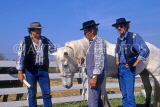 FRANCE, Languedoc-Roussillon, LA CAMARGUE, Cowboys with White Horse, FRA611JPL