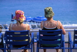 FRANCE, Provence, Cote d'Azure, NICE, Promenade des Anglais, two women on deckchairs, FRA291JPL