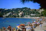 FRANCE, Provence, Cote d'Azure, St-Jean-Cap-Ferrat, Beaulieu-Sur-Mer, beach and sunbathers, FRA965JPL
