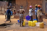 GAMBIA, Juffureh villagers (of 'Roots' fame) with water containers, GAM984JPL