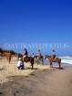 GAMBIA, Kotu Beach, tourists saddled up for horse riding, GAM1048JPL