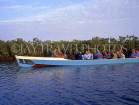 GAMBIA, River Gambia, tourists in dug out canoe (pirogues) on bird watching tour, GAM865JPL