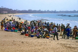 GAMBIA, fishing village scene, peopel gathered on beach to sort out catch, GAM922JPL