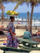 GAMBIA, fruit seller on beach, GAM896JPL