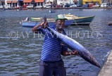 GRENADA, St George's, fisherman with Barracuda fish, GRE422JPL