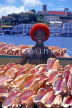 GRENADA, St George's, vendor with Conch shells, GRE434JPL