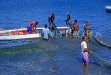 GRENADA, fishermen pulling net into boat, GRE424JPL