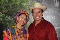 GUATEMALA, Antigua, Guatemalan couple in traditional attire, posing for photo, GUA338JPL