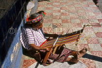GUATEMALA, Antigua, old woman weaving, GUA230JPL