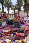 GUATEMALA, Antigua, street vendors selling traditional Indian woven materials, GUA108JPL
