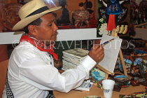 GUATEMALA, Guatemala City, artist painting, crafts, GUA262JPL