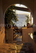 Greek Islands, PAROS, couple and sea view through archway, GIS598JPL