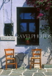 Greek Islands, PHOLEGANDROS, table and chairs by small restaurant, GIS695JPL