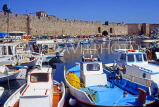 Greek Islands, RHODES, Rhodes Town, old town walls and harbour with fishing boats, GIS109JPL