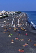 Greek Islands, SANTORINI, Kamari beach and sunbathers, GIS647JPL